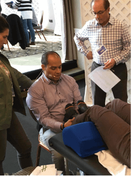 Dr Garcia with his clients & training