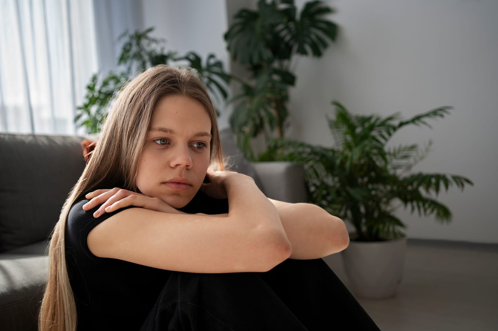 girl sitting alone