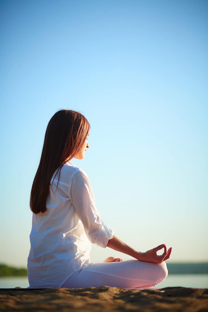 young-woman-practicing-meditation
