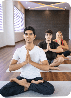 focused-people-meditating-yoga-class